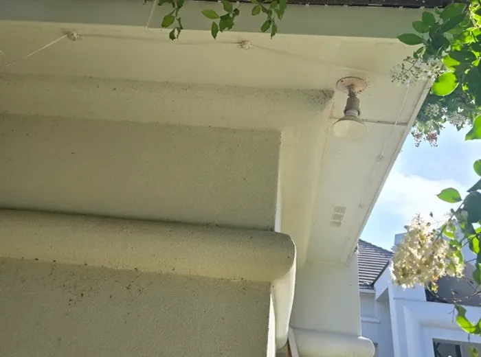 Repaired and repainted soffit corner
